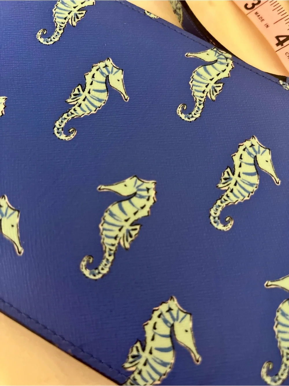 kate spade cobalt blue seahorse wristlet clutch